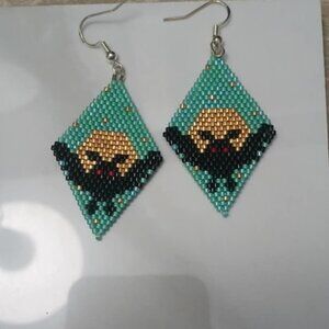 Handmade indigenous beadwork - mothman